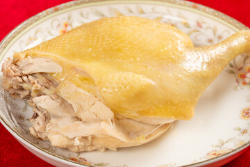 angle  view home-style poached half chicken at horizontal composition