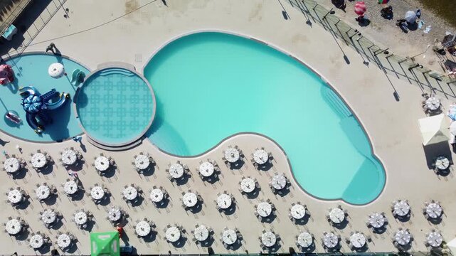 Aerial View of Ohrid Pool: Set Up for an Event by the Lake With Tables and Umbrellas