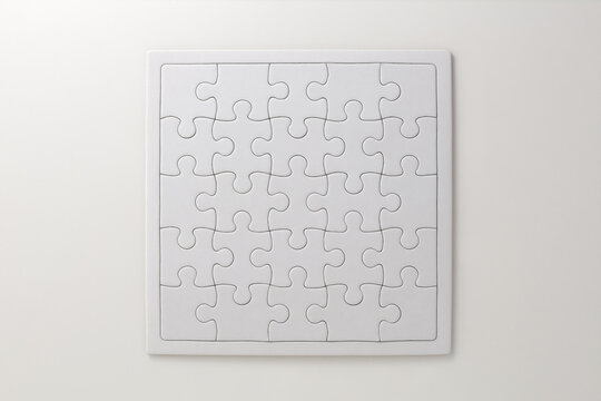 white puzzle pieces on white