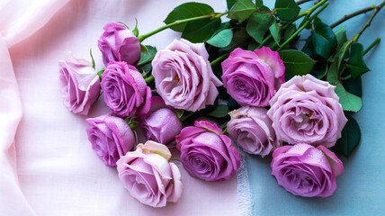 Flat lay roses, pink-purple corner composition, solid light background