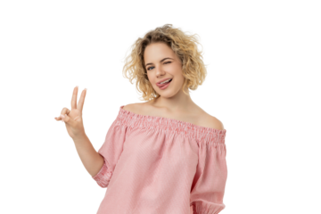 Blonde curly-haired woman winking with peace sign, isolated, PNG