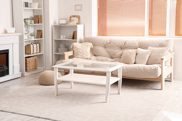Interior of modern living room with comfortable sofa and table