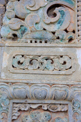 Vintage ornament on the stone. Close-up seamless texture. Stone texture. Embossed pattern.
