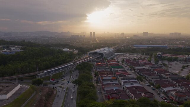 Sunrise hyperlapse areal view of LRT Station, Putra Heights, Malaysia