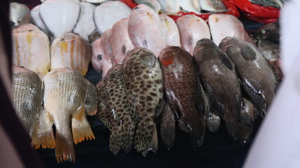 Some types of fresh fish in the traditional Indonesian market traders' stalls