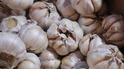 One Cardboard white Garlic in the Indonesian Traditional Market Traders Stalls
