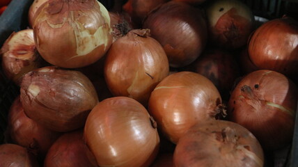 some onions in the stalls of Indonesian traditional market sellers