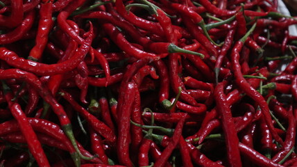 piles of red chili cayenne seller of Indonesian traditional markets
