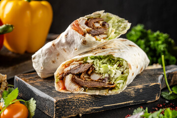 Fresh shawarma wrap with grilled meat and vegetables