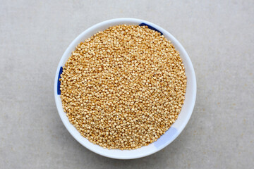 Raw quinoa seeds in a bowl.