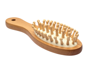 Wooden hairbrush with natural bristles, handle, oval head, and light background