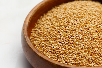 Raw quinoa seeds in a bowl.