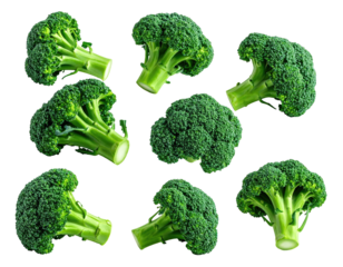 Eight vibrant, fresh broccoli florets isolated on a deep black background