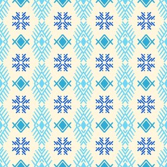 Winter seamless pattern with blue snowflakes and geometric elements. Nordic Christmas style background. Abstract vector illustration for holiday wrapping paper, fabric, or festive decoration.