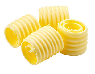 Close-up view of four spiraled butter curls with a soft, yellow-cream color
