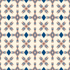Seamless geometric pattern with folk art motifs. Scandinavian style ornament with snowflakes or stars and diamonds. Vector illustration for background, textile, or wallpaper.
