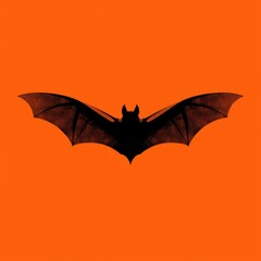 Fototapeta premium Black bat silhouette with spread wings on vivid orange background, minimal spooky Halloween design perfect for posters, banners, greeting cards, party invitations, flyers, and social media templates