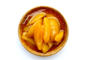 Sliced peaches in syrup served in a bowl