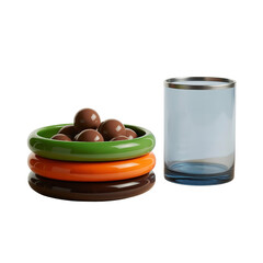 Stacked Colorful Dishes with Chocolate Balls and Blue-Based Glass  Modern Dessert Setup with Glossy Texture and Artistic Contrast