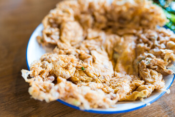 Thai crispy omelet stuff minced pork. Thai called Kai jeow moo sab