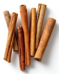 Collection Of Cinnamon Sticks On White Background