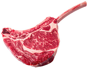 Thick, raw ribeye steak with bone-in handle, isolated on a black background