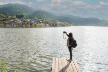 Lifestyle traveler women happy feeling good relax and freedom facing . Travel Concept