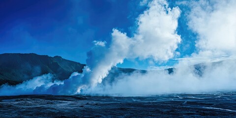 Naklejka premium A volcanic eruption with billowing smoke and steam, against a clear blue sky. The scene is set in a mountainous 