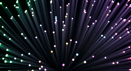 Abstract fiber optic network background with brightly glowing multi-colored light dots, symbolizing high-speed digital data transmission, telecommunications, broadband internet, and modern technology