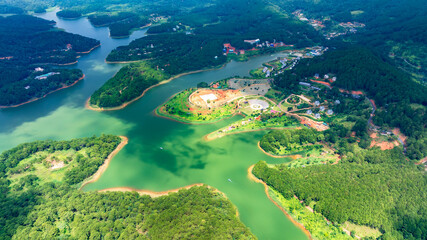 Aerial view of Tuyen Lam lake in Dalat, Vietnam with blue water and paradise islands below give this place a relaxing tourist attraction. This is a hydroelectric lake that provides energy for highland