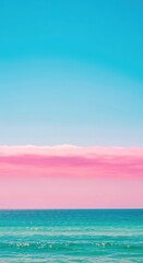 Turquoise Ocean Waves with Pink Clouds and Azure Sky on Clear Sunny Day
