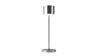 A modern floor lamp with a cylindrical lampshade illuminates a black background, showcasing a contemporary design with metallic accents.