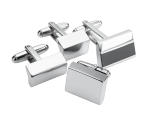 Polished silver cufflinks elegantly arranged against a stark black background, showcasing refined geometric shapes and reflective surfaces which highlight their luxurious design and subtle elegance.