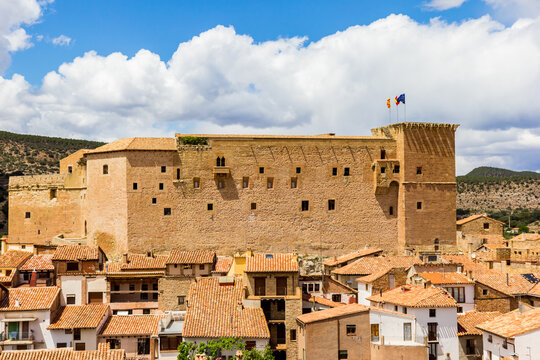 traditional spanish houses in front of the historic castle in tMora de Rubielos, Spain