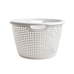 White, plastic laundry basket against a black backdrop