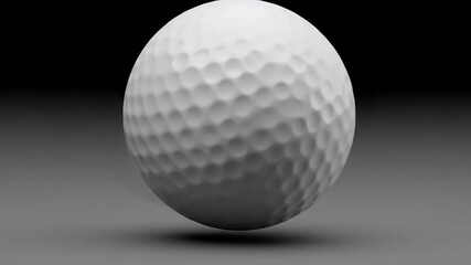 Close up of a golf ball in motion with dimples visible.