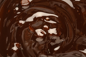 Sweet hot chocolate with chips as background, closeup