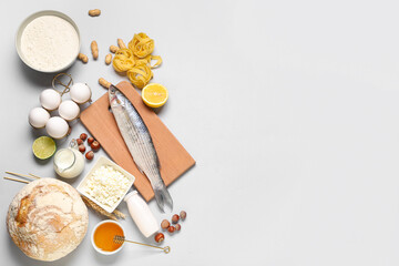 Different products on grey background. Food Allergy Awareness Month