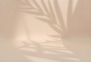 A shadow of a palm leaf on a beige wall, the light is soft and diffused , creating a calm and relaxing atmosphere.