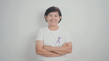 Elderly with Purple Ribbon for Violence, Pancreatic, Esophageal, Testicular cancer, Alzheimer, Epilepsy, Lupus, Crohn, Thyroid,  Sarcoidosis and Fibromyalgia. Awareness month and World cancer day