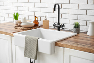 Counters with sink and clean napkin in kitchen