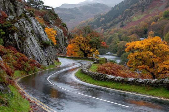 Winding mountain road in autumn, wet and colorful - Powered by Adobe