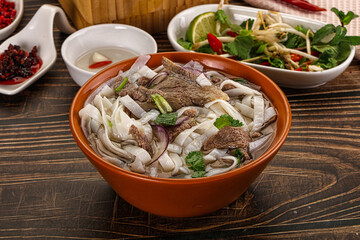 Vietnamese Pho Bo soup with beef and noodles