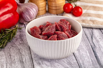 Raw beef meat cubes pieces