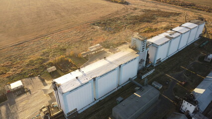 Fototapeta premium Aerial View of Massive White Grain Silo and Storage Complex