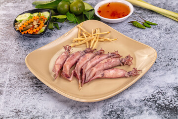 Boiled wild mini calamari snack