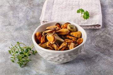 Peeled mussels heap in the bowl
