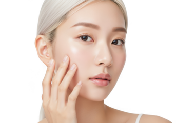 Closeup of a beautiful asian woman with fair skin touching her face isolated on transparent background, highlighting skincare and beauty practices