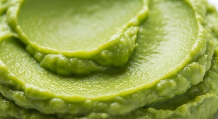 Close up of a swirl of bright green wasabi paste