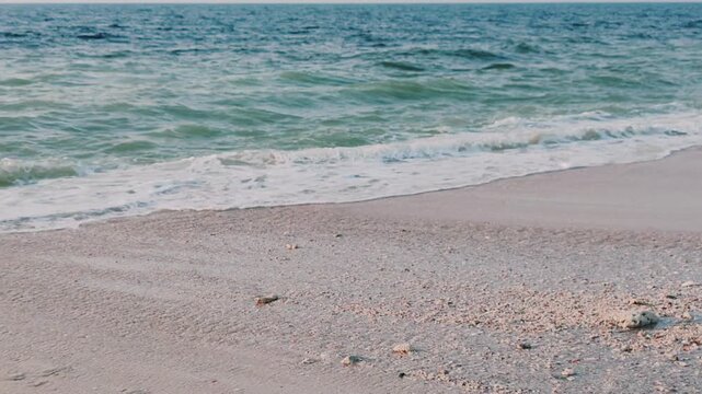Water waves Sea Shore Beautiful Panorama white sand beach and turquoise water View.
Holiday summer beach background, Wave of sea on White sandy beach.
Enjoy Holiday on Public Beach Heavy Water Waves